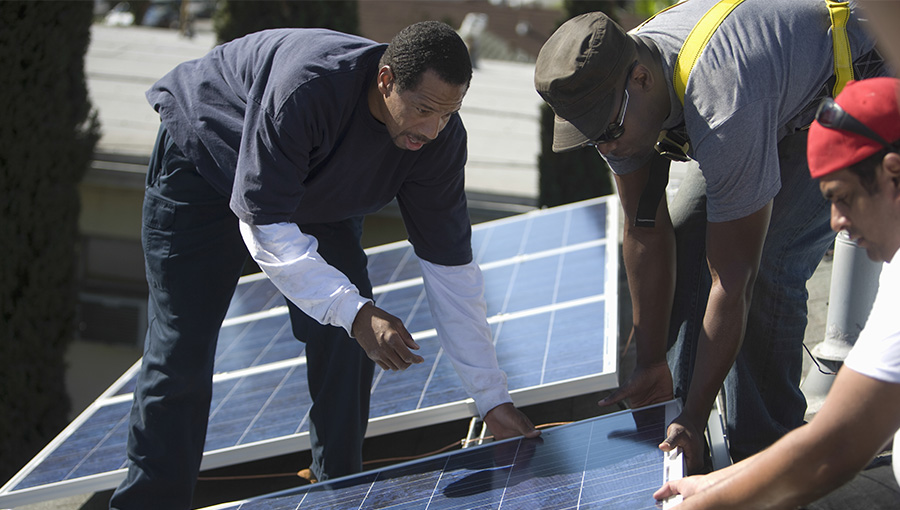 solar contractor installing solar panels  