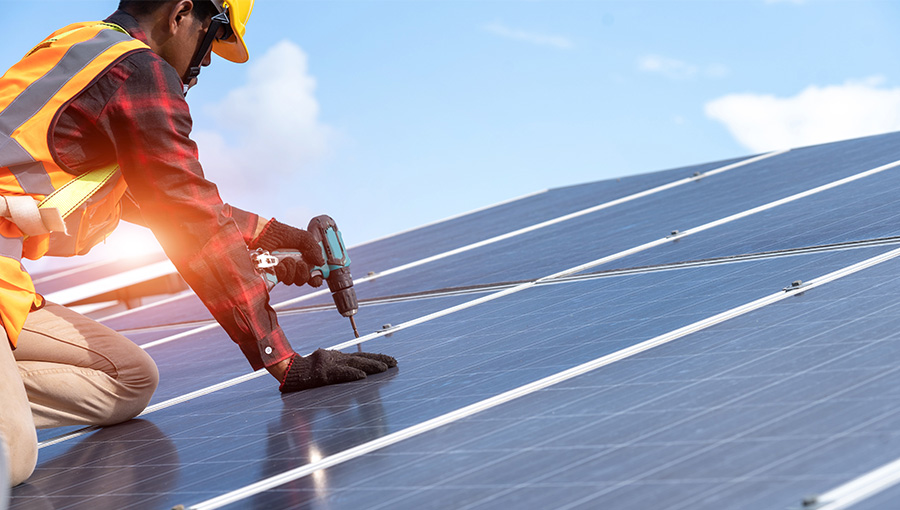 person installing solar panels 