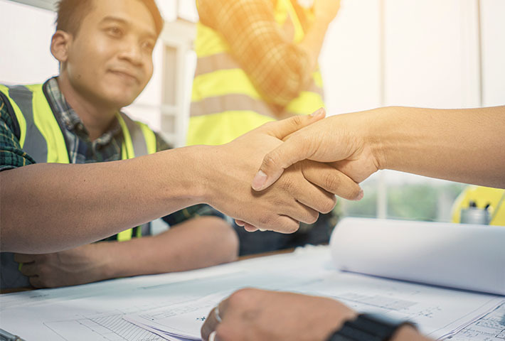 Interviewing shaking hands